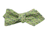 Green bow tie with animal pattern